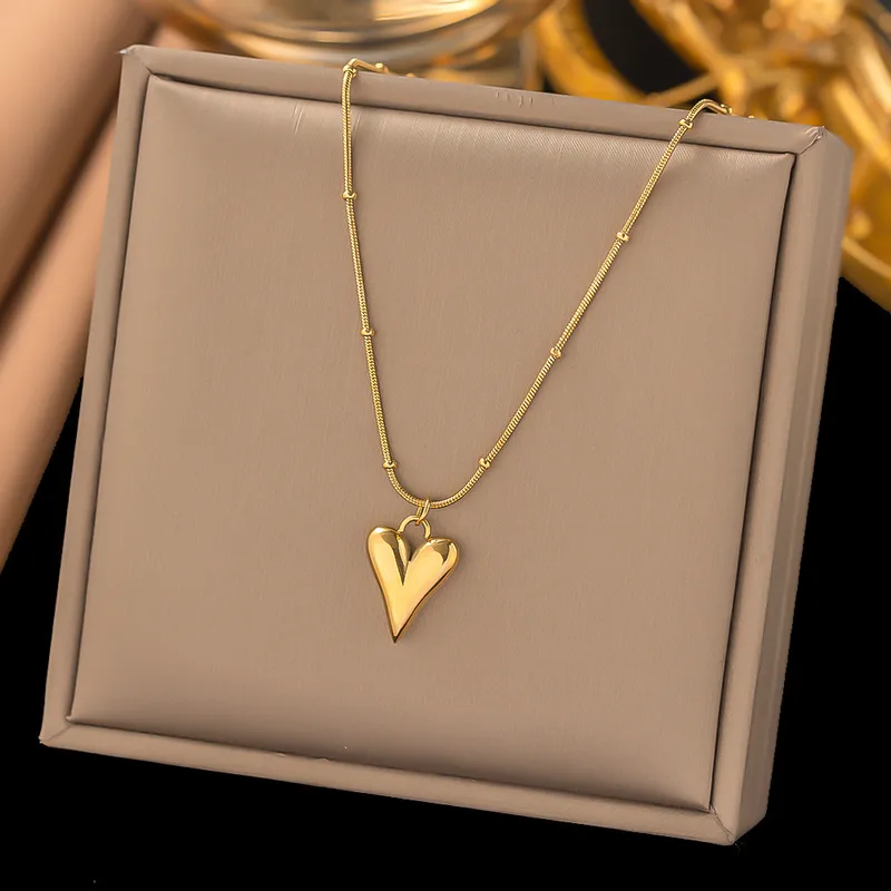 Golden Elongated Heart Charm Necklace