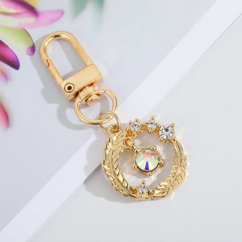 Gemini said Golden Laurel Wreath Crystal Keychain