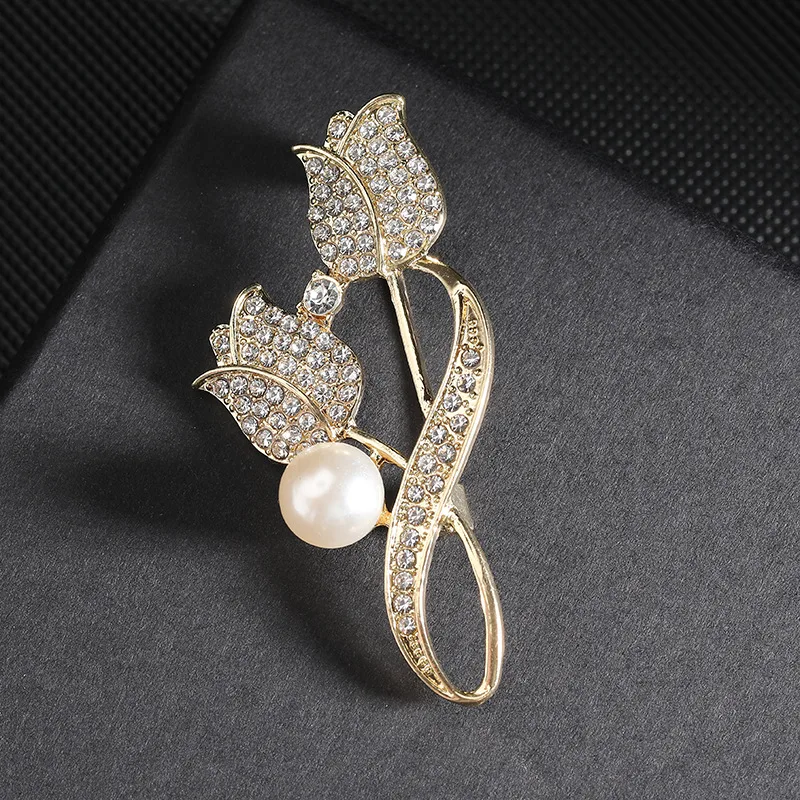 Gemini said Elegant Dual-Tulip Crystal & Pearl Brooch